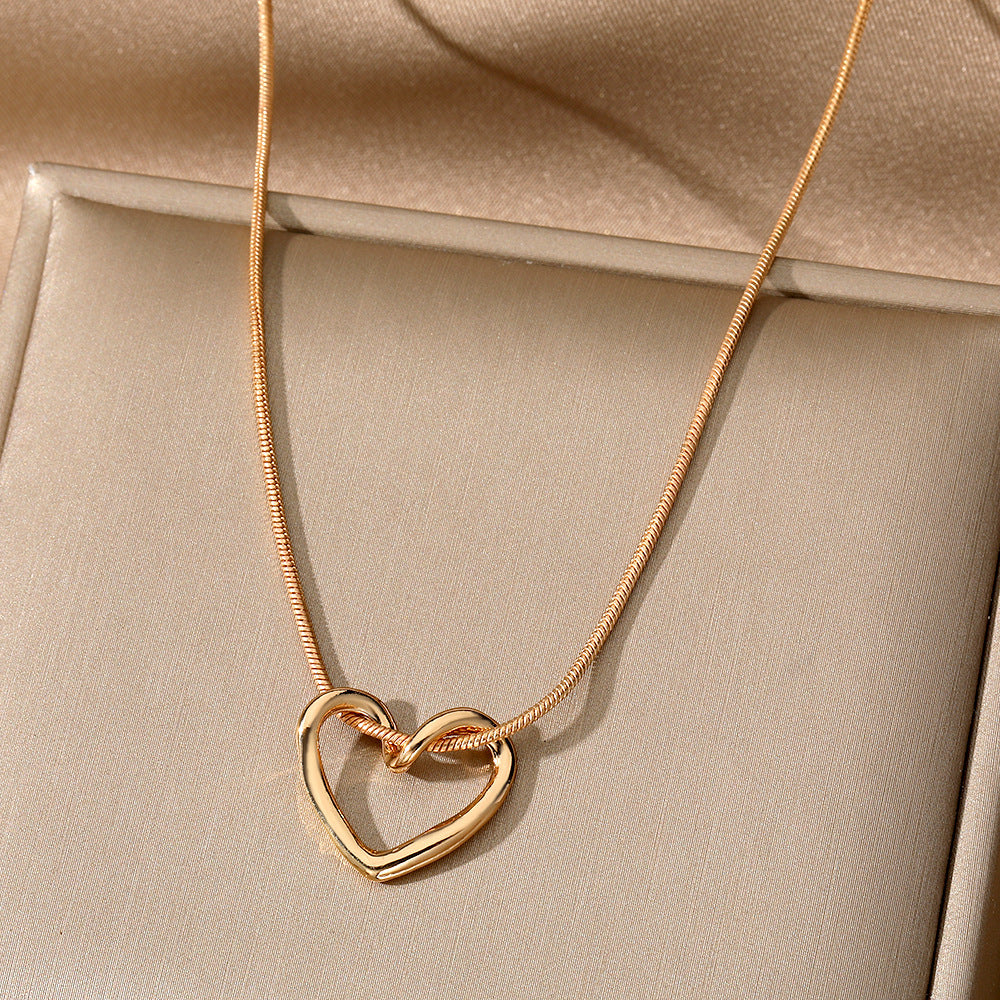 Women's Niche Hollow Heart Necklace – Geometric Love Design