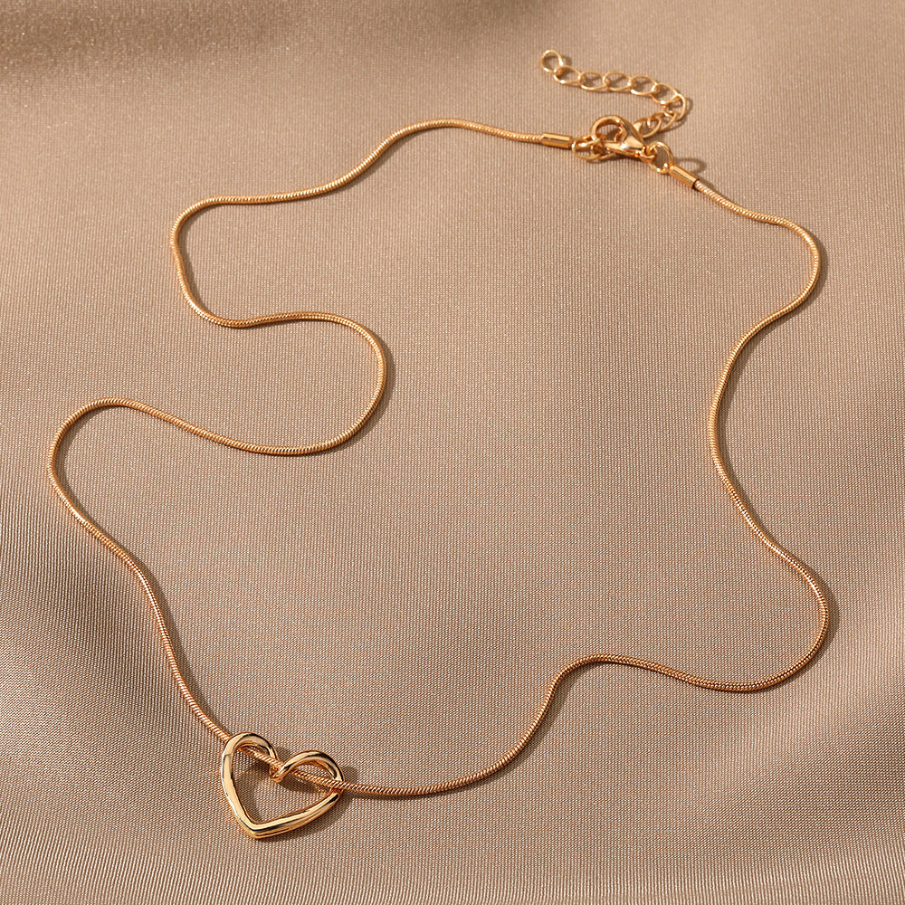 Women's Niche Hollow Heart Necklace – Geometric Love Design