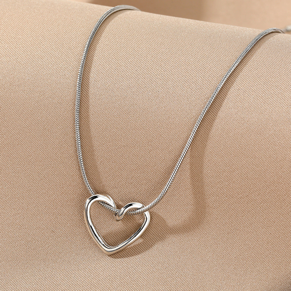 Women's Niche Hollow Heart Necklace – Geometric Love Design