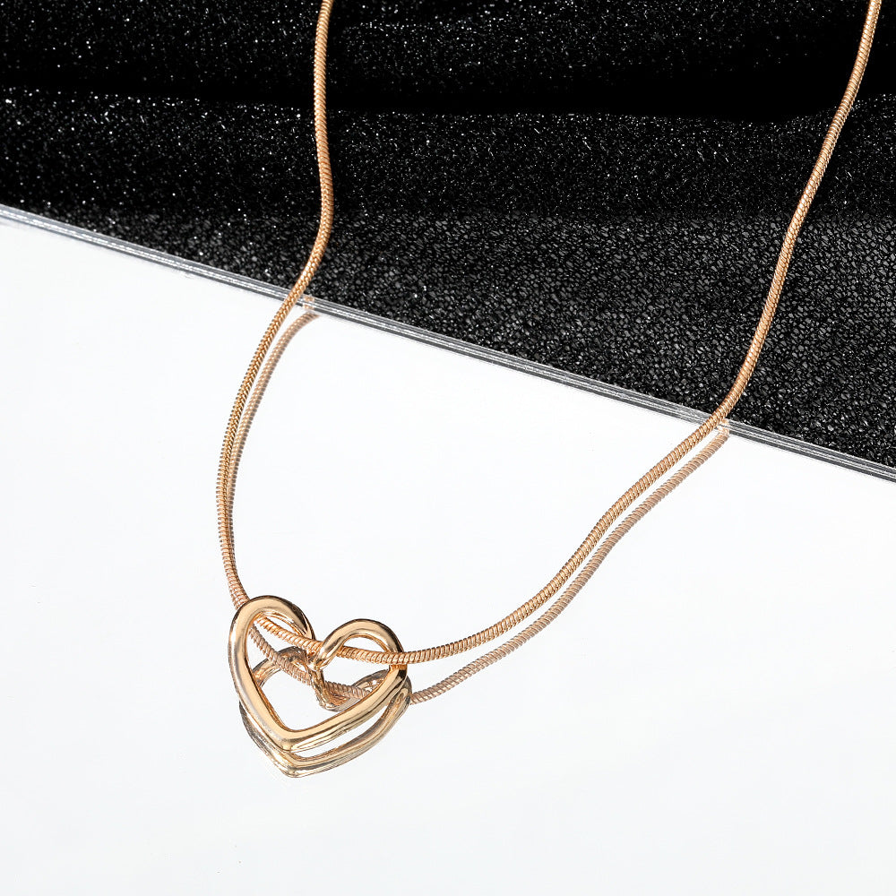 Women's Niche Hollow Heart Necklace – Geometric Love Design